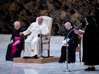 Pope Francis attends his Wednesday General Audience at Paul VI Hall in Vatican City, Vatican, on December 18, 2024. (