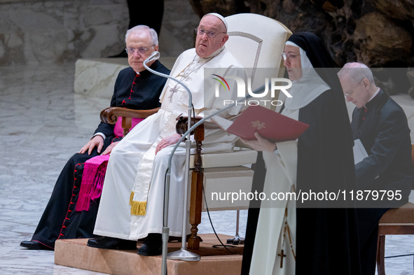 Pope Francis attends his Wednesday General Audience at Paul VI Hall in Vatican City, Vatican, on December 18, 2024. 