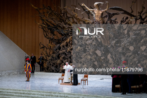 Pope Francis attends his Wednesday General Audience at Paul VI Hall in Vatican City, Vatican, on December 18, 2024. 