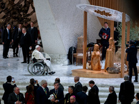 Pope Francis greets the presepe at the end of his Wednesday General Audience at Paul VI Hall in Vatican City, Vatican, on December 18, 2024...