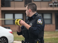 Baltimore County Police investigate a shots fired call in the area of Wycombe Way and Glenbarr Court in Parkville, Maryland, United States,...