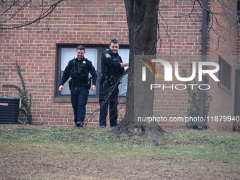 Baltimore County Police investigate a shots fired call in the area of Wycombe Way and Glenbarr Court in Parkville, Maryland, United States,...