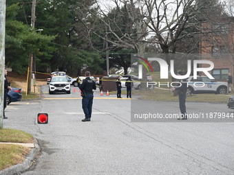 Baltimore County Police investigate a shots fired call in the area of Wycombe Way and Glenbarr Court in Parkville, Maryland, United States,...