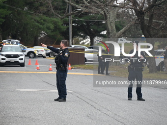 Baltimore County Police investigate a shots fired call in the area of Wycombe Way and Glenbarr Court in Parkville, Maryland, United States,...