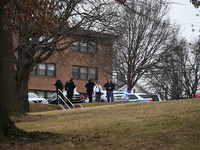 Baltimore County Police investigate a shots fired call in the area of Wycombe Way and Glenbarr Court in Parkville, Maryland, United States,...