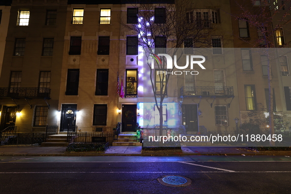 Christmas lights are on display outside a townhouse in the Upper East Side section of New York, N.Y., on December 15, 2024. 