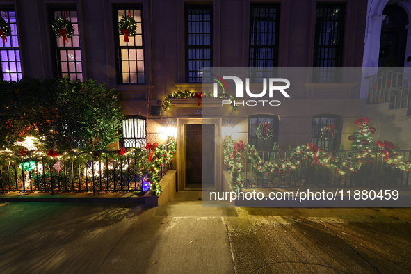 Christmas lights are on display outside a townhouse in the Upper East Side section of New York, N.Y., on December 15, 2024. 