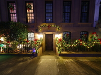 Christmas lights are on display outside a townhouse in the Upper East Side section of New York, N.Y., on December 15, 2024. (