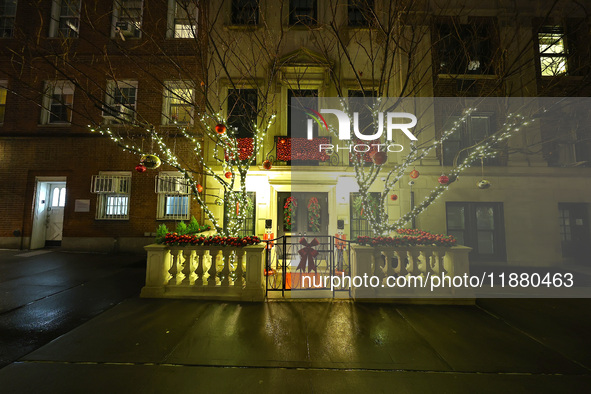 Christmas lights are on display outside a townhouse in the Upper East Side section of New York, N.Y., on December 16, 2024. 