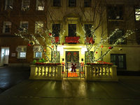 Christmas lights are on display outside a townhouse in the Upper East Side section of New York, N.Y., on December 16, 2024. (