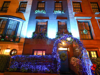 Christmas lights are on display outside a townhouse in the Upper East Side section of New York, N.Y., on December 16, 2024. (