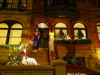 Christmas lights are on display outside a townhouse in the Carnegie Hill section of New York, N.Y., on December 15, 2024. (