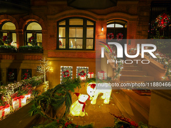 Christmas lights are on display outside a townhouse in the Carnegie Hill section of New York, N.Y., on December 15, 2024. (