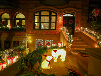 Christmas lights are on display outside a townhouse in the Carnegie Hill section of New York, N.Y., on December 15, 2024. (