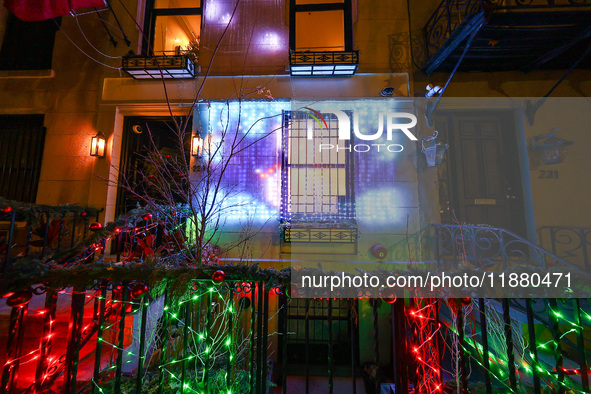 Christmas lights are on display outside a townhouse in the Upper East Side section of New York, N.Y., on December 15, 2024. 