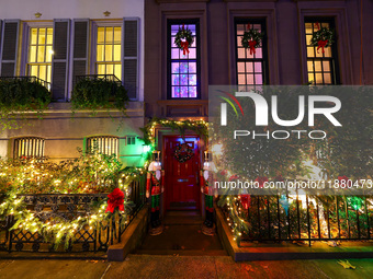 Christmas lights are on display outside a townhouse in the Upper East Side section of New York, N.Y., on December 15, 2024. (