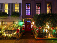 Christmas lights are on display outside a townhouse in the Upper East Side section of New York, N.Y., on December 15, 2024. (