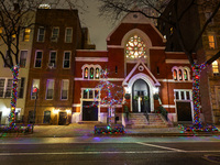 Christmas lights are on display outside a townhouse in the Upper East Side section of New York, N.Y., on December 15, 2024. (