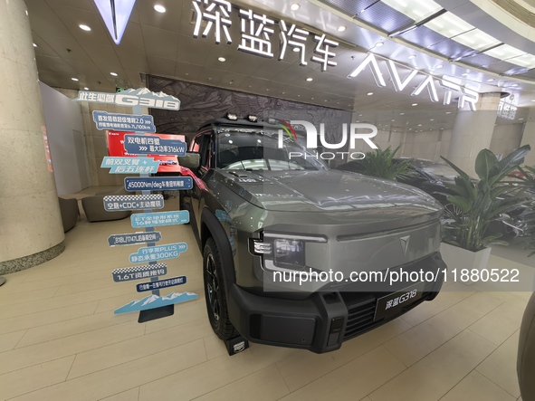 A DEEPAI new energy vehicle is displayed in the hall of NORINCO GROUP in Beijing, China, on December 17, 2024. 