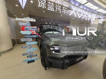 A DEEPAI new energy vehicle is displayed in the hall of NORINCO GROUP in Beijing, China, on December 17, 2024. (