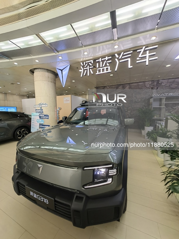 A DEEPAI new energy vehicle is displayed in the hall of NORINCO GROUP in Beijing, China, on December 17, 2024. 