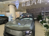 A DEEPAI new energy vehicle is displayed in the hall of NORINCO GROUP in Beijing, China, on December 17, 2024. (