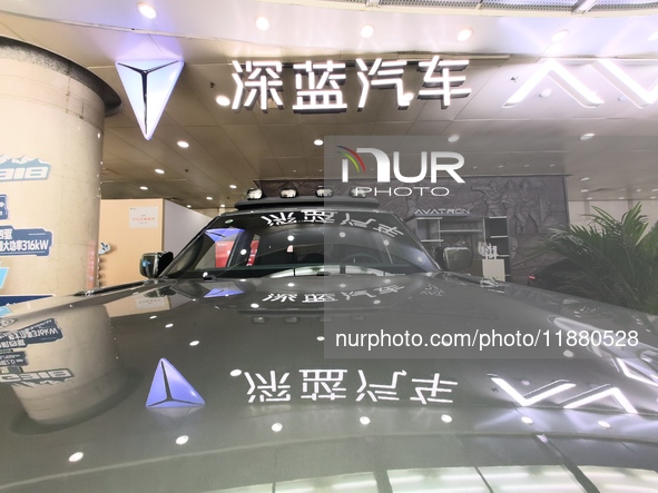 A DEEPAI new energy vehicle is displayed in the hall of NORINCO GROUP in Beijing, China, on December 17, 2024. 