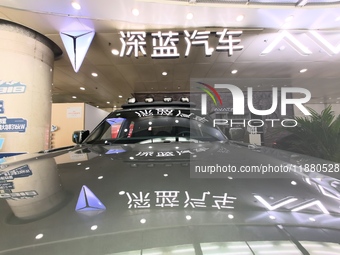 A DEEPAI new energy vehicle is displayed in the hall of NORINCO GROUP in Beijing, China, on December 17, 2024. (