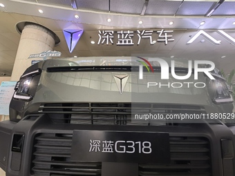 A DEEPAI new energy vehicle is displayed in the hall of NORINCO GROUP in Beijing, China, on December 17, 2024. (