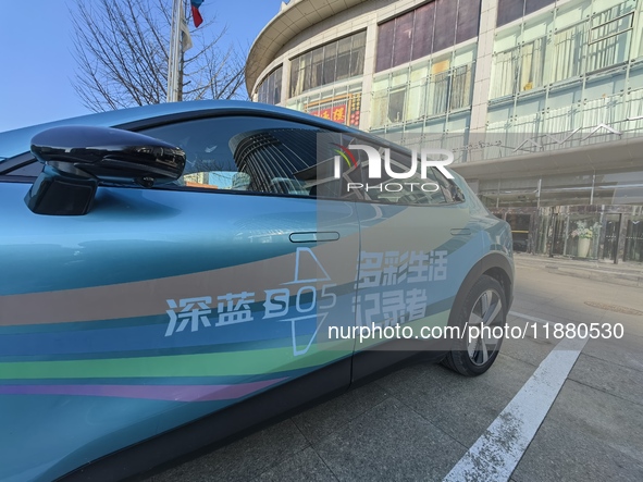 A DEEPAI new energy vehicle is displayed in the hall of NORINCO GROUP in Beijing, China, on December 17, 2024. 