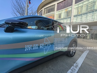 A DEEPAI new energy vehicle is displayed in the hall of NORINCO GROUP in Beijing, China, on December 17, 2024. (