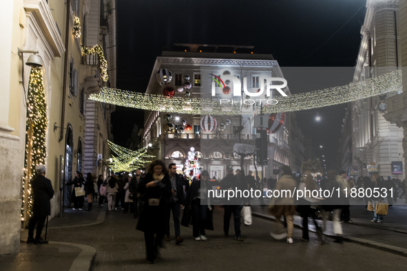 Italian shoppers browse Christmas gifts in central Rome, Italy, on December 18, 2024. Consumer activity in the run-up to Christmas is key to...