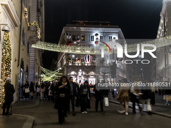 Italian shoppers browse Christmas gifts in central Rome, Italy, on December 18, 2024. Consumer activity in the run-up to Christmas is key to...