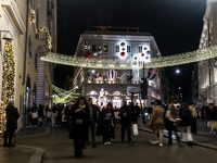 Italian shoppers browse Christmas gifts in central Rome, Italy, on December 18, 2024. Consumer activity in the run-up to Christmas is key to...