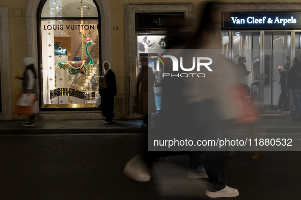 Italian shoppers browse Christmas gifts in central Rome, Italy, on December 18, 2024. Consumer activity in the run-up to Christmas is key to...