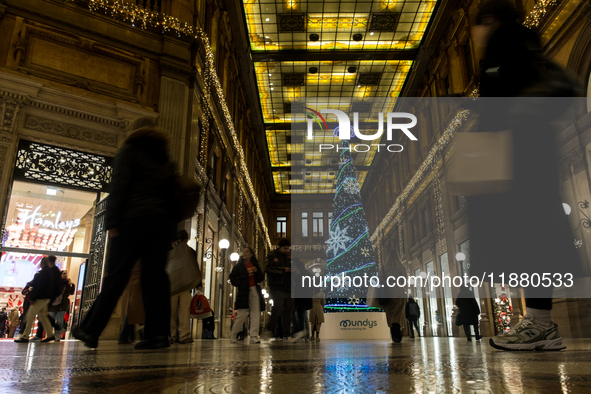 Italian shoppers browse Christmas gifts in central Rome, Italy, on December 18, 2024. Consumer activity in the run-up to Christmas is key to...