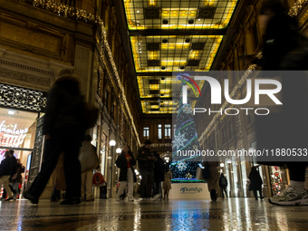 Italian shoppers browse Christmas gifts in central Rome, Italy, on December 18, 2024. Consumer activity in the run-up to Christmas is key to...