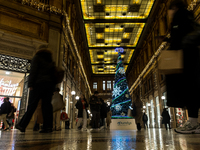 Italian shoppers browse Christmas gifts in central Rome, Italy, on December 18, 2024. Consumer activity in the run-up to Christmas is key to...