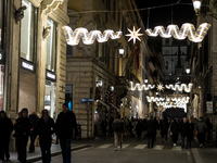 Italian shoppers browse Christmas gifts in central Rome, Italy, on December 18, 2024. Consumer activity in the run-up to Christmas is key to...