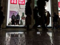 Italian shoppers browse Christmas gifts in central Rome, Italy, on December 18, 2024. Consumer activity in the run-up to Christmas is key to...