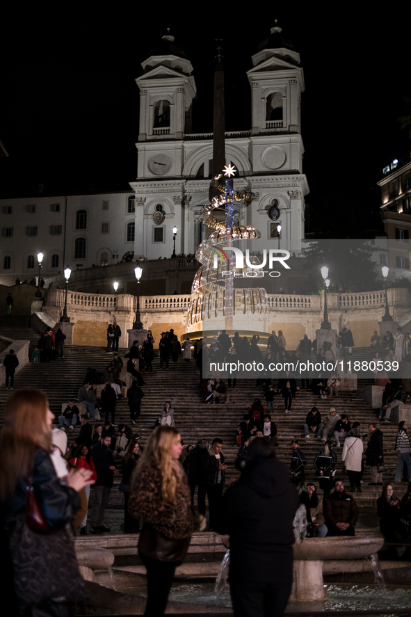 Italian shoppers browse Christmas gifts in central Rome, Italy, on December 18, 2024. Consumer activity in the run-up to Christmas is key to...