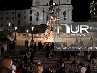 Italian shoppers browse Christmas gifts in central Rome, Italy, on December 18, 2024. Consumer activity in the run-up to Christmas is key to...