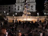 Italian shoppers browse Christmas gifts in central Rome, Italy, on December 18, 2024. Consumer activity in the run-up to Christmas is key to...