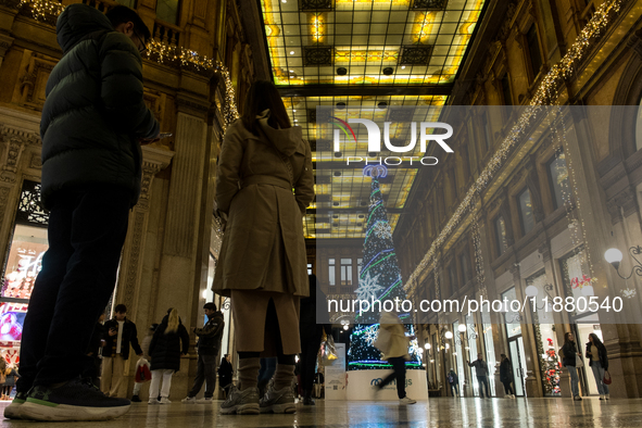 Italian shoppers browse Christmas gifts in central Rome, Italy, on December 18, 2024. Consumer activity in the run-up to Christmas is key to...