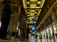 Italian shoppers browse Christmas gifts in central Rome, Italy, on December 18, 2024. Consumer activity in the run-up to Christmas is key to...