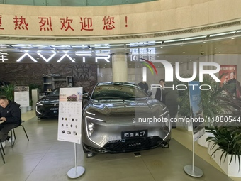 An AVATR new energy vehicle is displayed in the hall of NORINCO GROUP in Beijing, China, on December 17, 2024. (