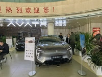 An AVATR new energy vehicle is displayed in the hall of NORINCO GROUP in Beijing, China, on December 17, 2024. (