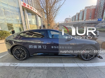 An AVATR new energy vehicle is displayed in the hall of NORINCO GROUP in Beijing, China, on December 17, 2024. (