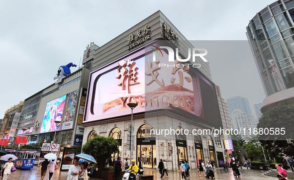 The newly opened Youngor Clothing Mall is on Nanjing Road pedestrian street in Shanghai, China, on October 15, 2024. 