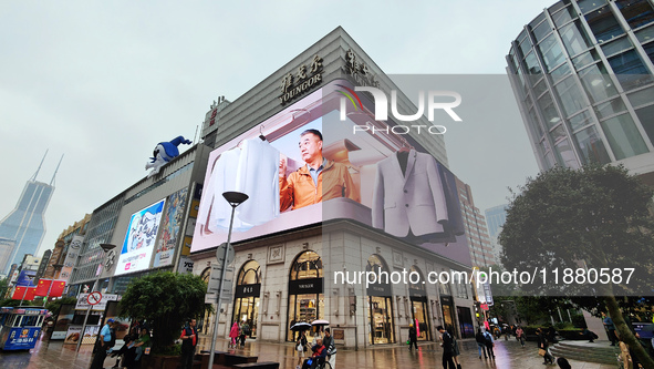 The newly opened Youngor Clothing Mall is on Nanjing Road pedestrian street in Shanghai, China, on October 15, 2024. 